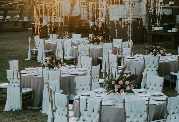 Beautiful outdoor event with lighting and seating