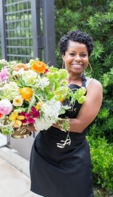 Goodshuffle Pro user, Sherronda Scoggins of floral company KC Events & Florals with a bouquet