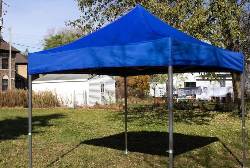 blue_pop_up_tent_backyard_party blue pop-up tent for backyard party